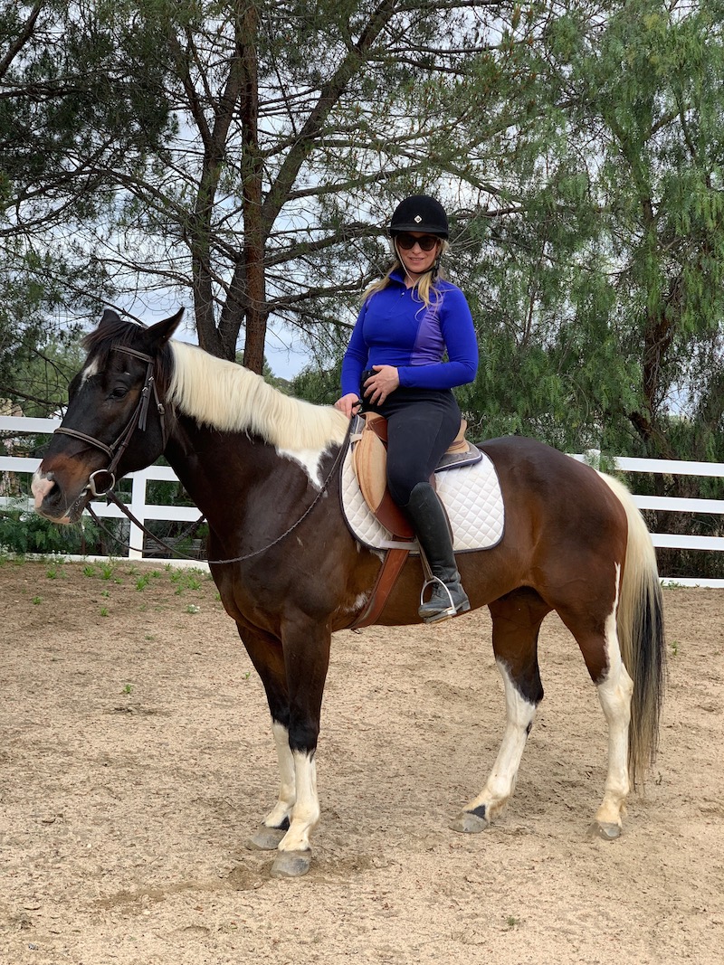 riding horse at 2 months pregnant - holding my itty-bitty baby bump while seated on Stanley my APHA gelding